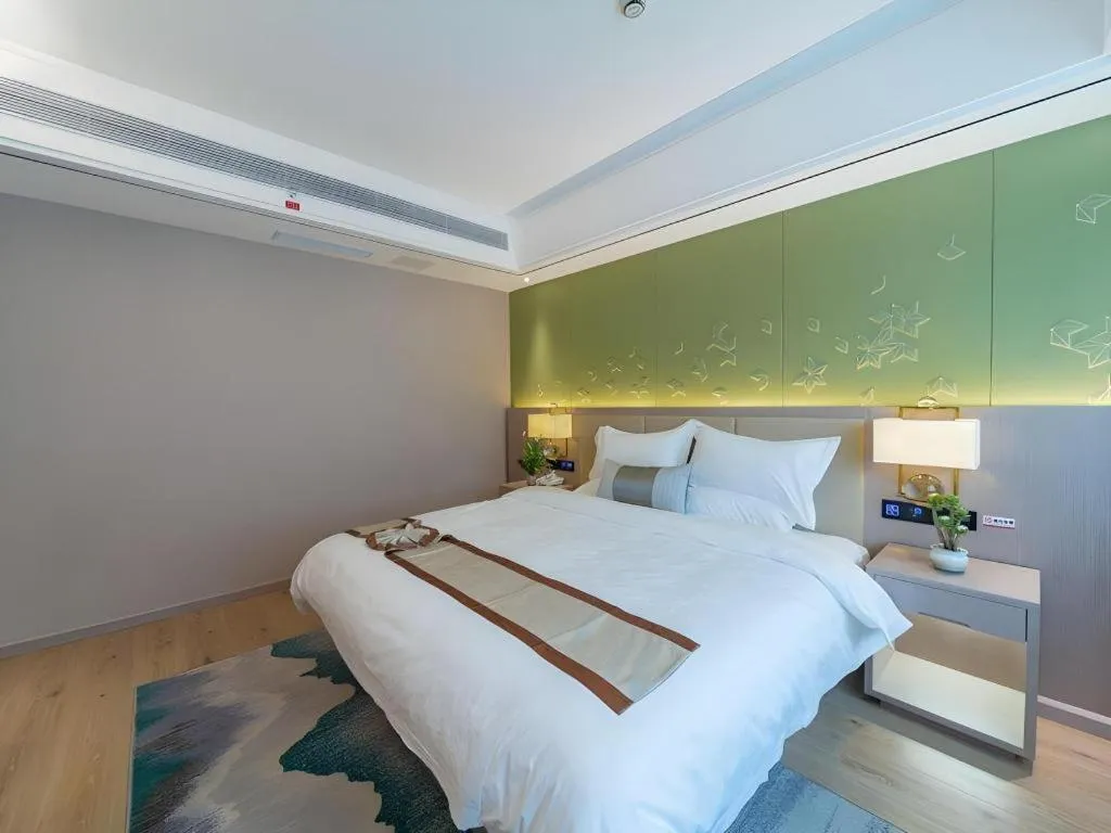 Bed in GreenTree Eastern Dali Railway Station Hotel