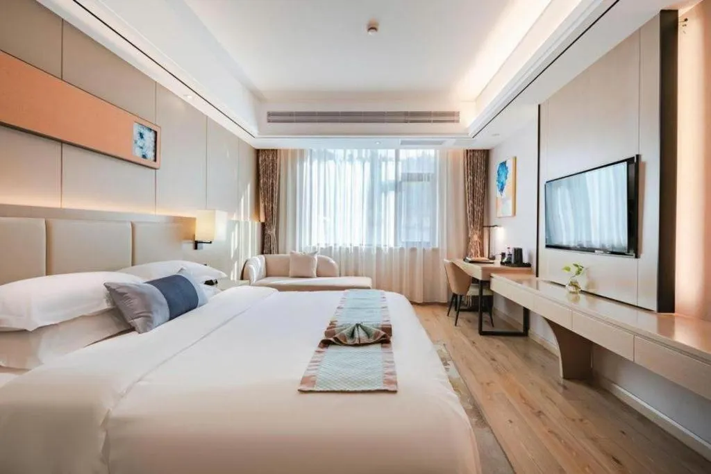 Bed in GreenTree Eastern Dali Railway Station Hotel