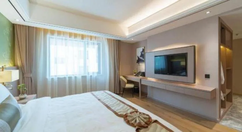 Bed in GreenTree Eastern Dali Railway Station Hotel