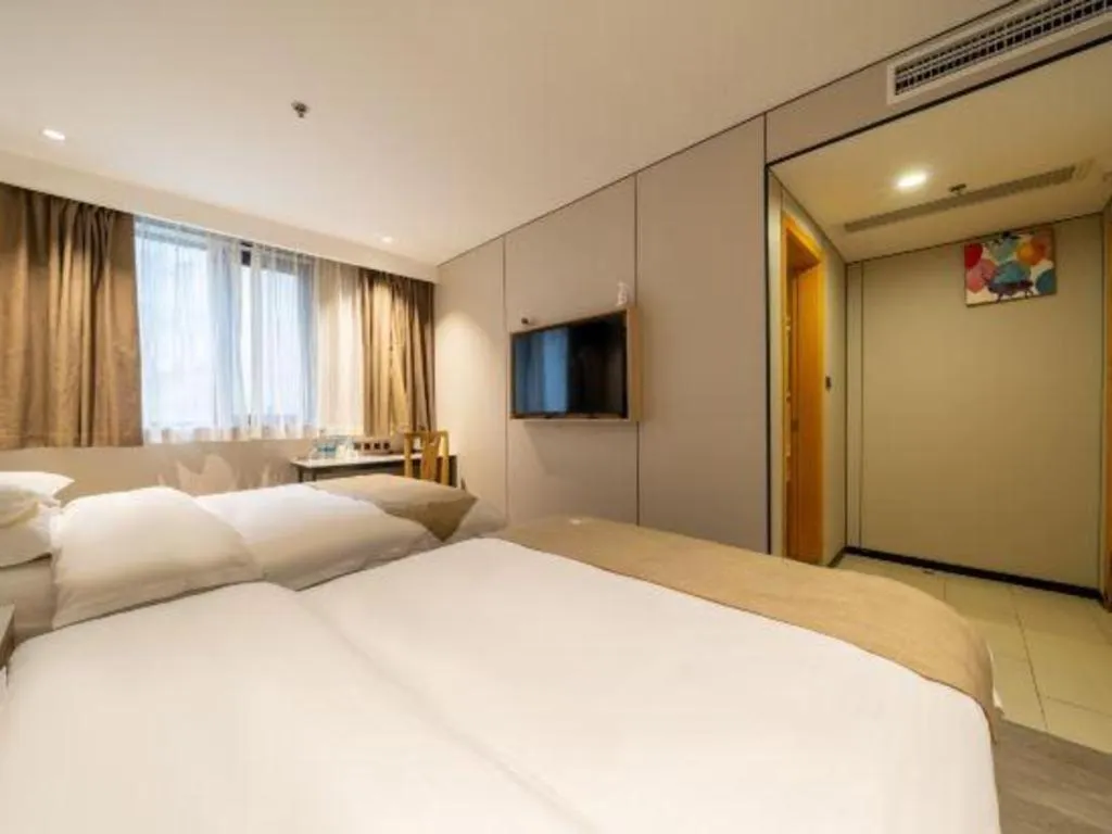 Bed in GreenTree Inn Shanghai Railway Station Macao Road