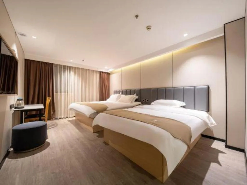 Bed in GreenTree Inn Shanghai Railway Station Macao Road