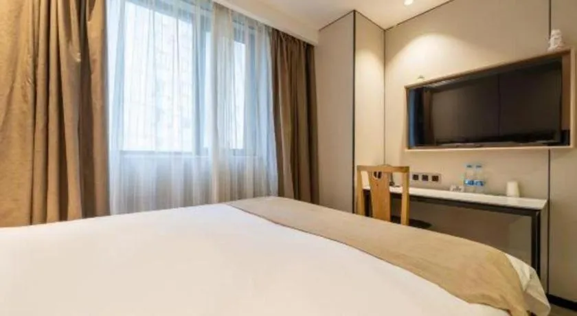 Bed in GreenTree Inn Shanghai Railway Station Macao Road