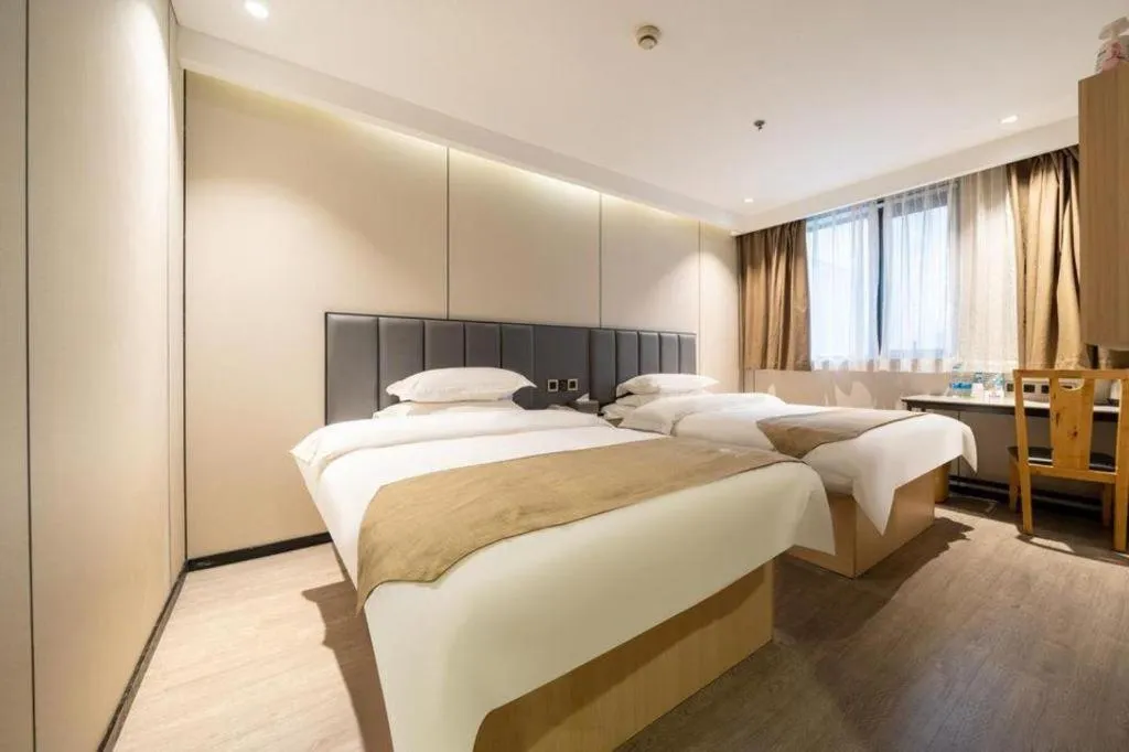 Bed in GreenTree Inn Shanghai Railway Station Macao Road