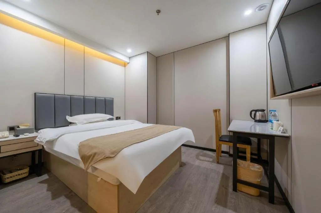 Bed in GreenTree Inn Shanghai Railway Station Macao Road