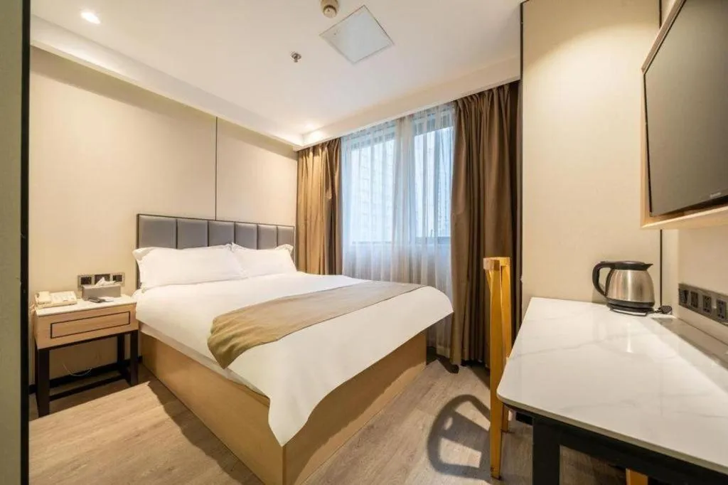 Bed in GreenTree Inn Shanghai Railway Station Macao Road