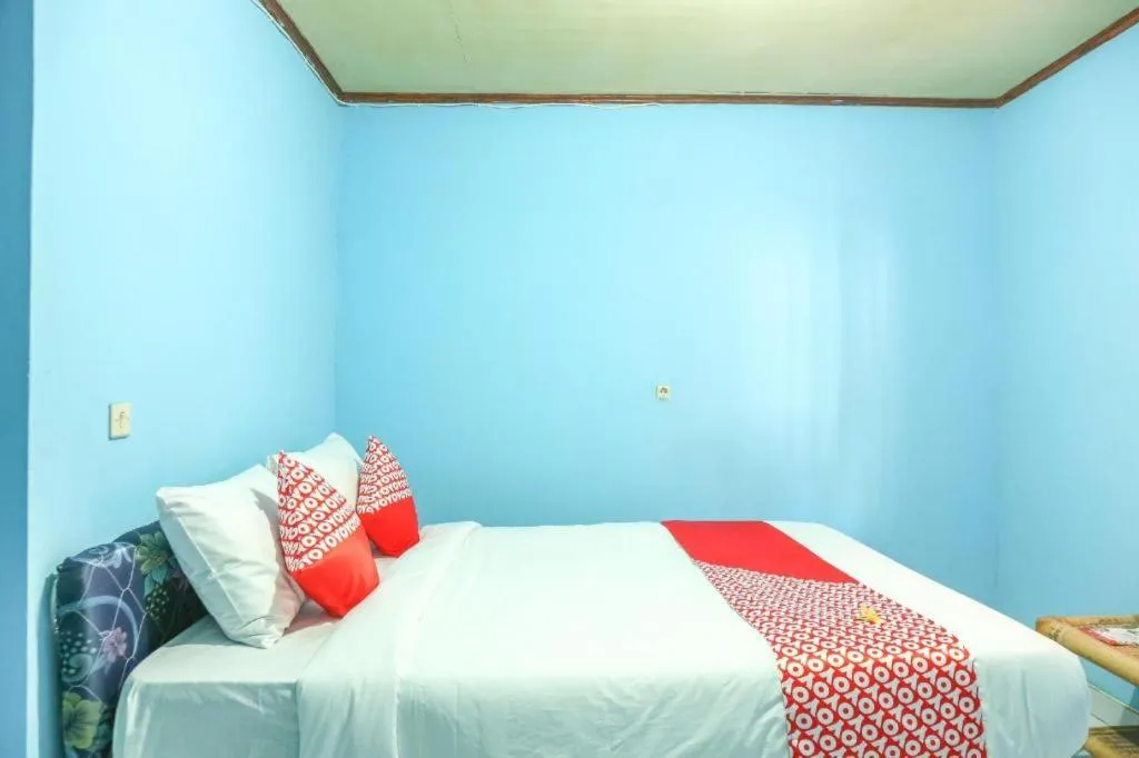 Bed in OYO 1662 Zury Homestay