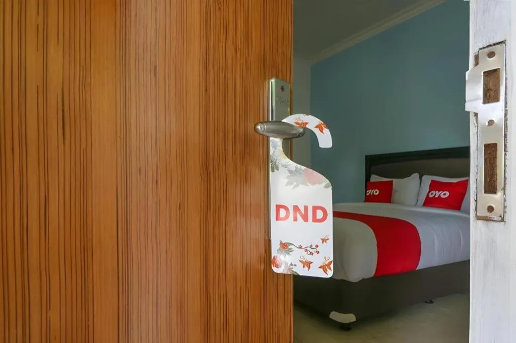 Bed in OYO 1755 De'balcon Accomodation Near Ngurah Rai Airport