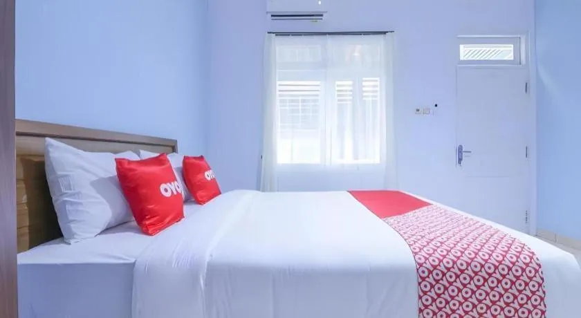 Bed in OYO 1755 De'balcon Accomodation Near Ngurah Rai Airport