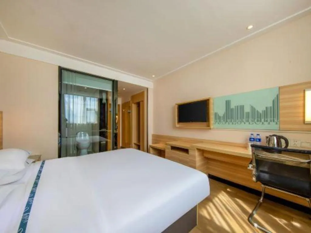 Bed in City Comfort Inn Zhanjiang Shimao Building Chikan Old Street