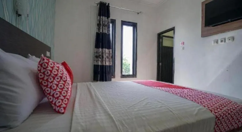 Bed in Hotel O Green Palm Kostel Syariah