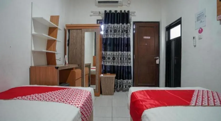 Bed in Hotel O Green Palm Kostel Syariah