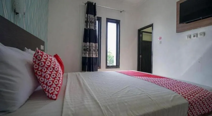 Bed in Hotel O Green Palm Kostel Syariah