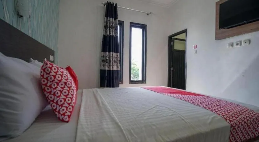 Bed in Hotel O Green Palm Kostel Syariah