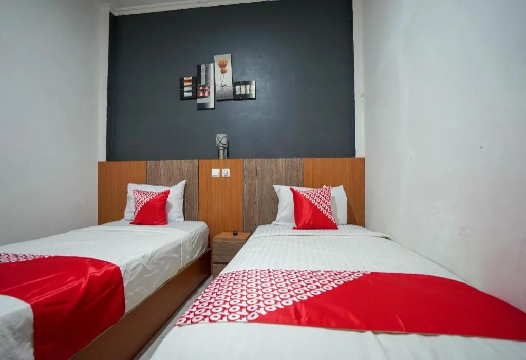 Bed in Hotel O Green Palm Kostel Syariah