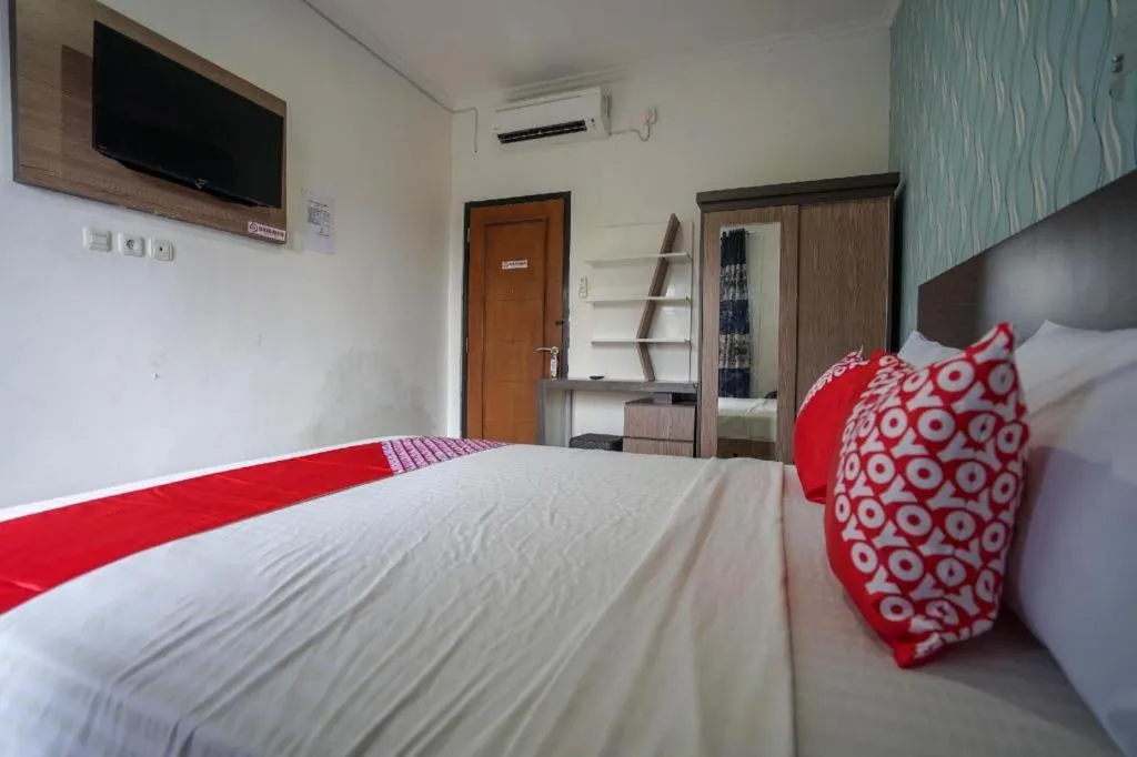Bed in Hotel O Green Palm Kostel Syariah