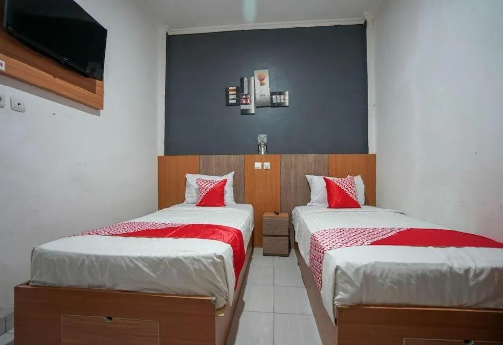 Bed in Hotel O Green Palm Kostel Syariah