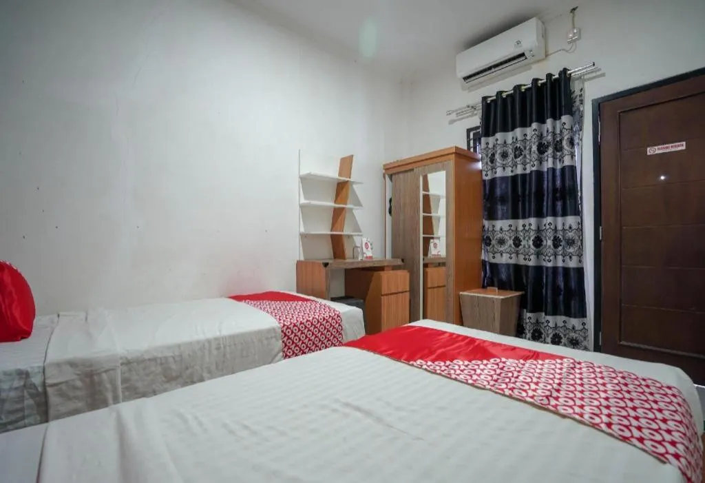 Bed in Hotel O Green Palm Kostel Syariah