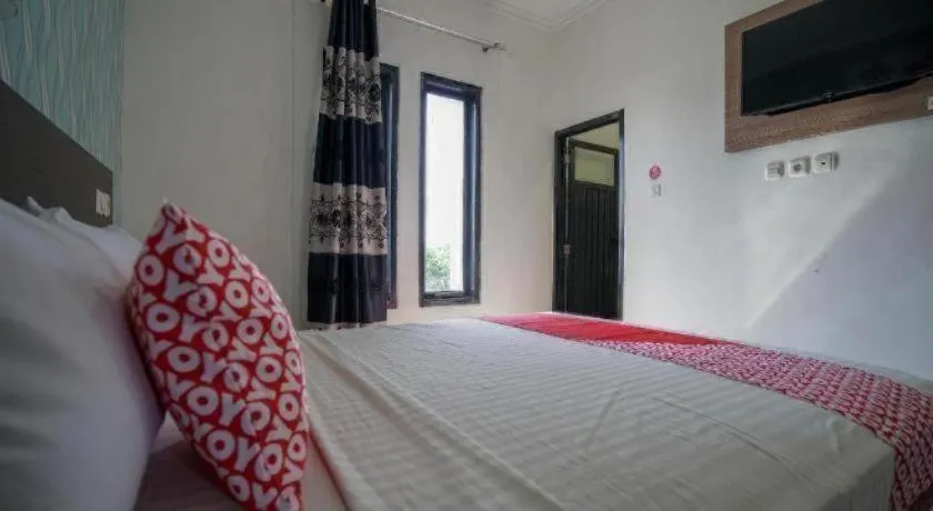 Bed in Hotel O Green Palm Kostel Syariah