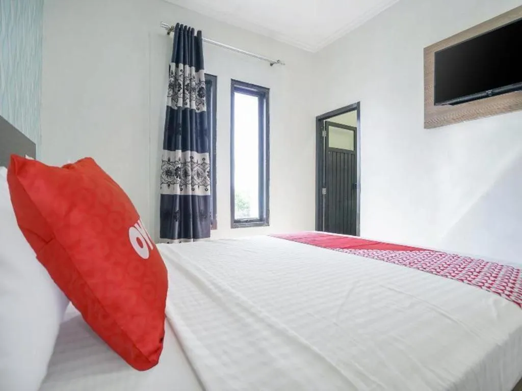 Bed in Hotel O Green Palm Kostel Syariah