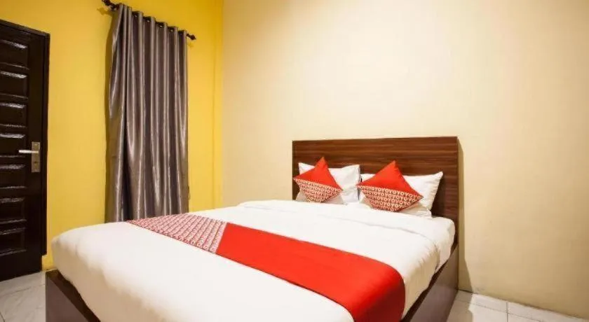 Bed in Hotel O Bunga Raya Residence