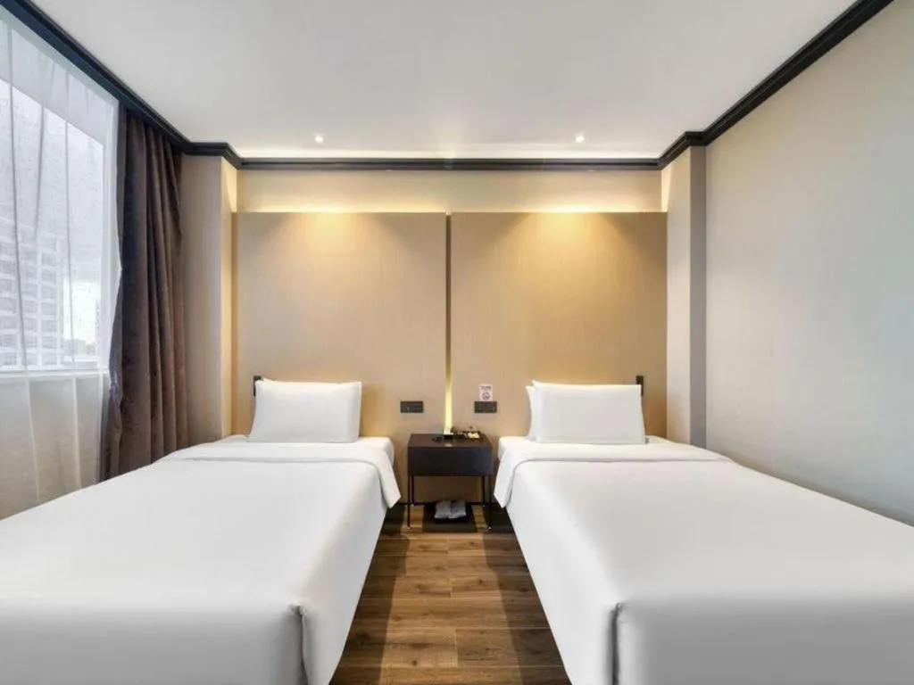 Bed in Atour Light Hotel Hangzhou Future Sci-Tech City