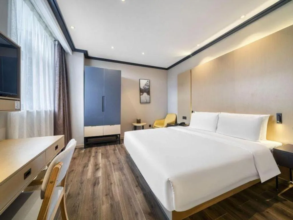 Bed in Atour Light Hotel Hangzhou Future Sci-Tech City
