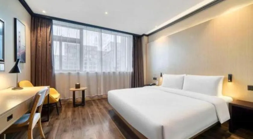 Bed in Atour Light Hotel Hangzhou Future Sci-Tech City