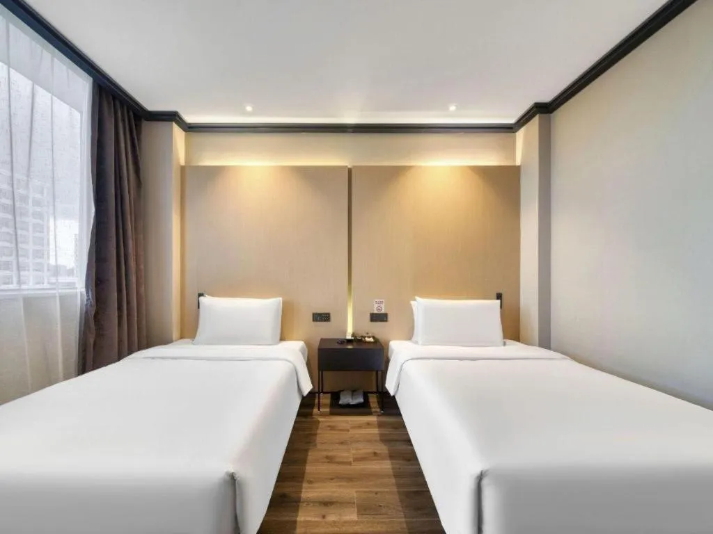 Bed in Atour Light Hotel Hangzhou Future Sci-Tech City