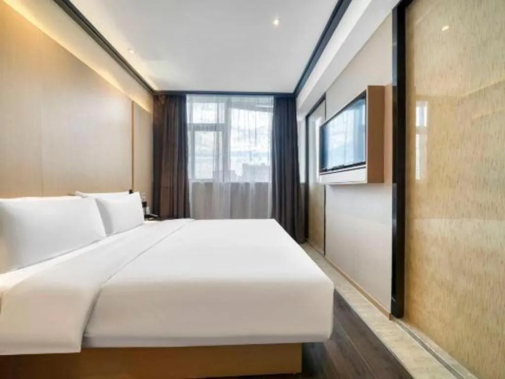 Bed in Atour Light Hotel Hangzhou Future Sci-Tech City