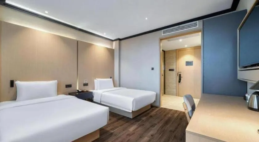 Bed in Atour Light Hotel Hangzhou Future Sci-Tech City