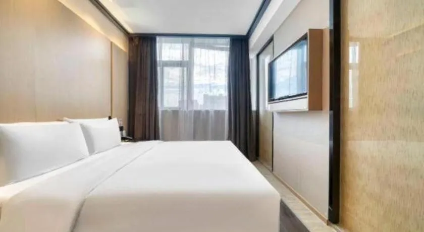 Bed in Atour Light Hotel Hangzhou Future Sci-Tech City