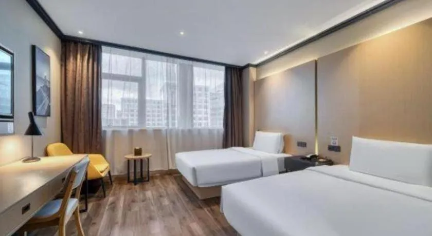 Bed in Atour Light Hotel Hangzhou Future Sci-Tech City