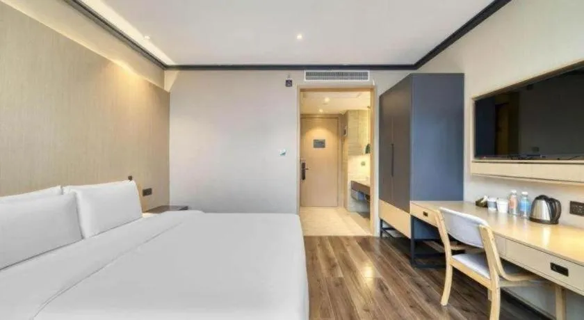 Bed in Atour Light Hotel Hangzhou Future Sci-Tech City