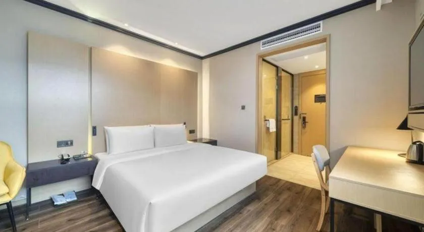 Bed in Atour Light Hotel Hangzhou Future Sci-Tech City