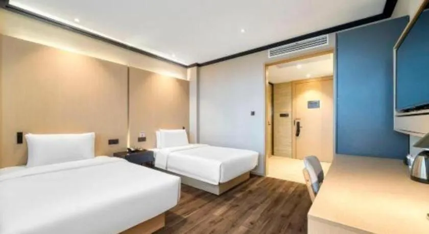 Bed in Atour Light Hotel Hangzhou Future Sci-Tech City