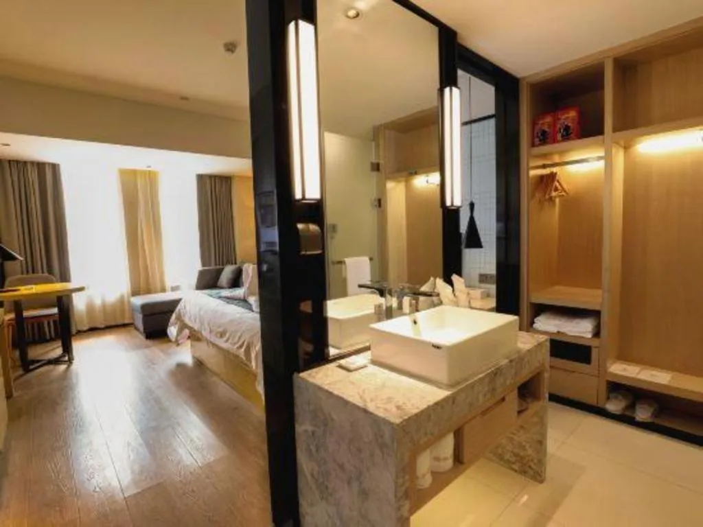 Bed in GreenTree Eastern Hotel Hunan Changsha Xinsha Luositang Metro Station