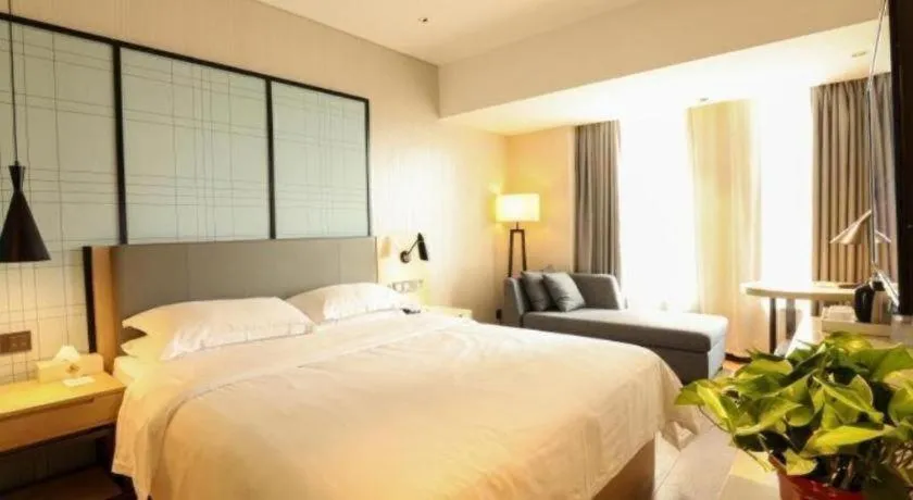 Bed in GreenTree Eastern Hotel Hunan Changsha Xinsha Luositang Metro Station