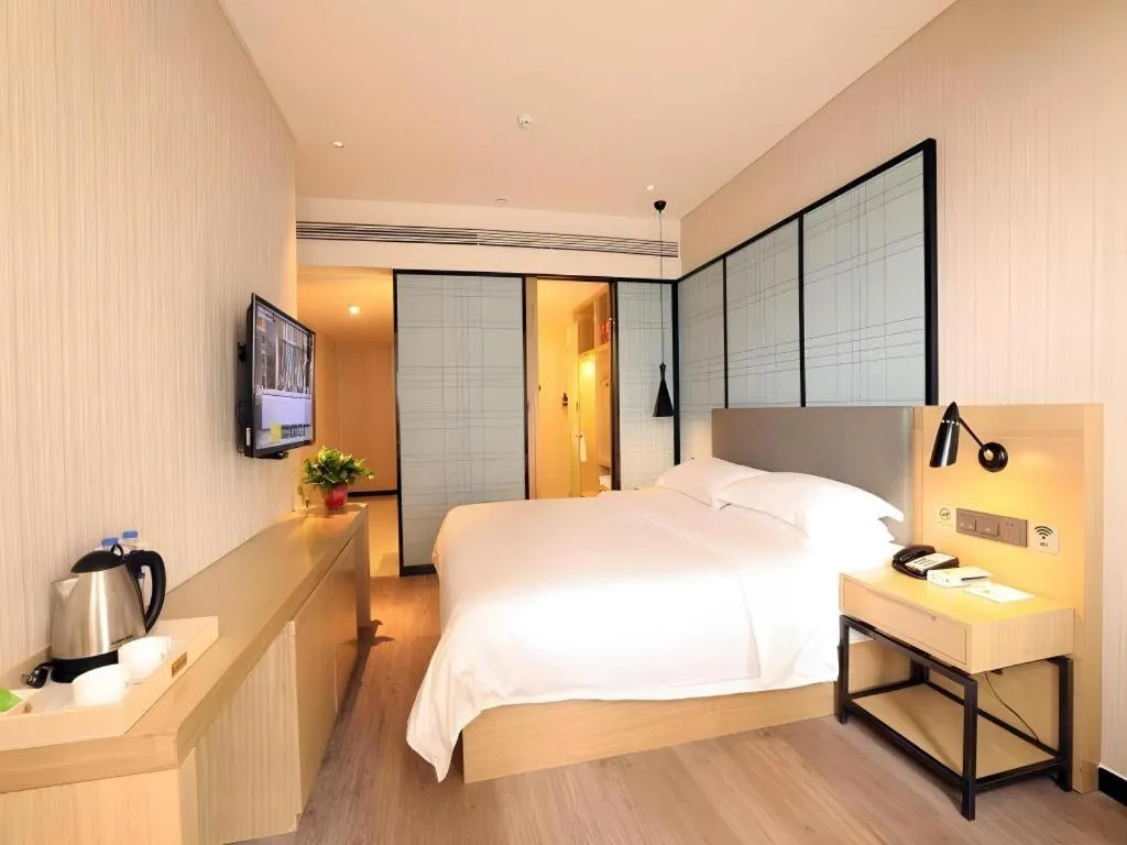 Bed in GreenTree Eastern Hotel Hunan Changsha Xinsha Luositang Metro Station