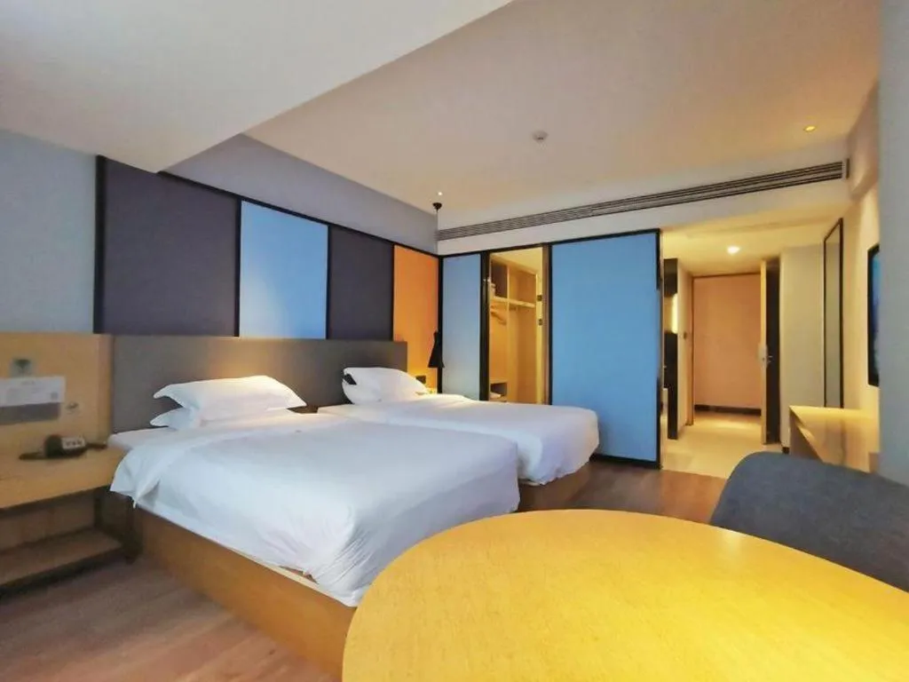 Bed in GreenTree Eastern Hotel Hunan Changsha Xinsha Luositang Metro Station