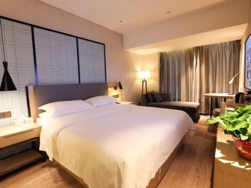 Bed in GreenTree Eastern Hotel Hunan Changsha Xinsha Luositang Metro Station