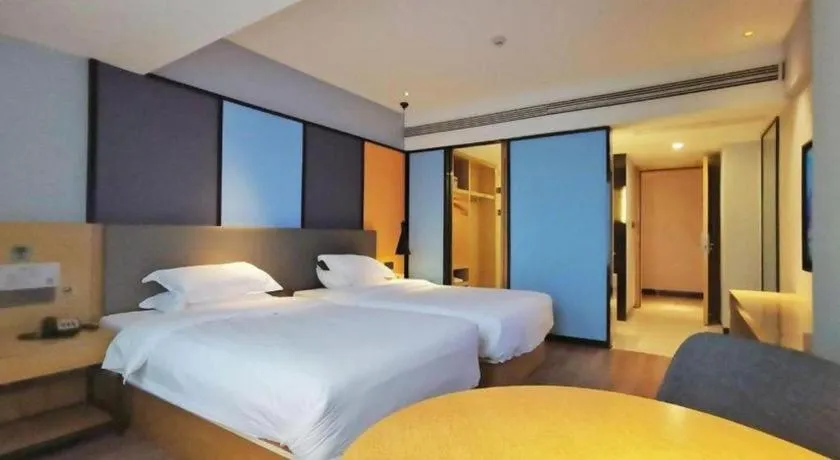 Bed in GreenTree Eastern Hotel Hunan Changsha Xinsha Luositang Metro Station