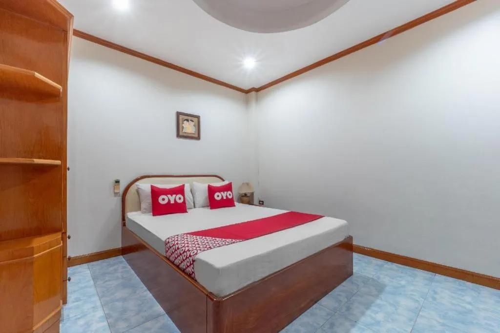 Bed in OYO 1125 Chokdee Inn