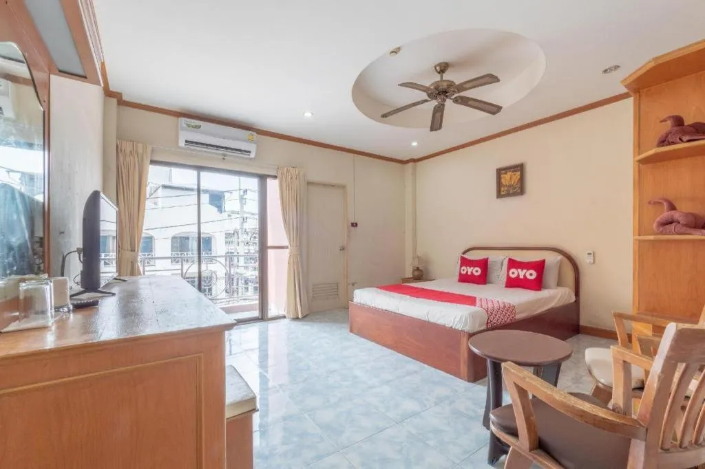 Bed in OYO 1125 Chokdee Inn