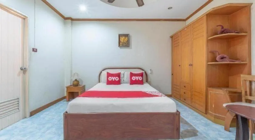 Bed in OYO 1125 Chokdee Inn