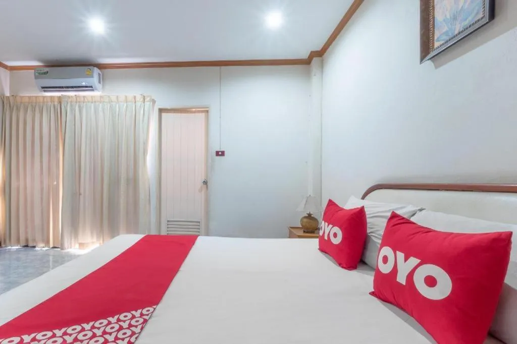 Bed in OYO 1125 Chokdee Inn