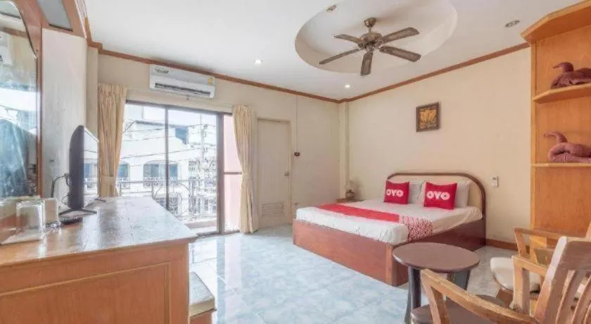 Bed in OYO 1125 Chokdee Inn