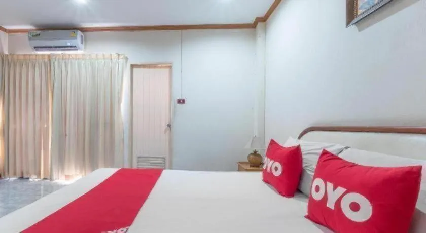 Bed in OYO 1125 Chokdee Inn