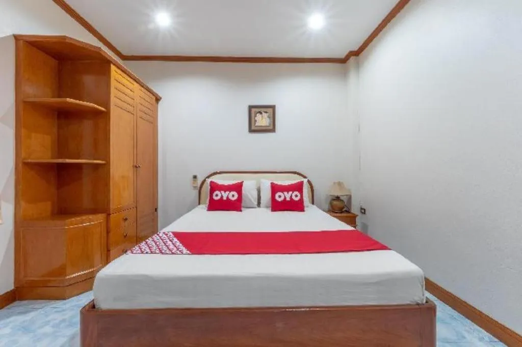 Bed in OYO 1125 Chokdee Inn