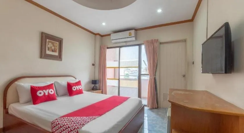 Bed in OYO 1125 Chokdee Inn