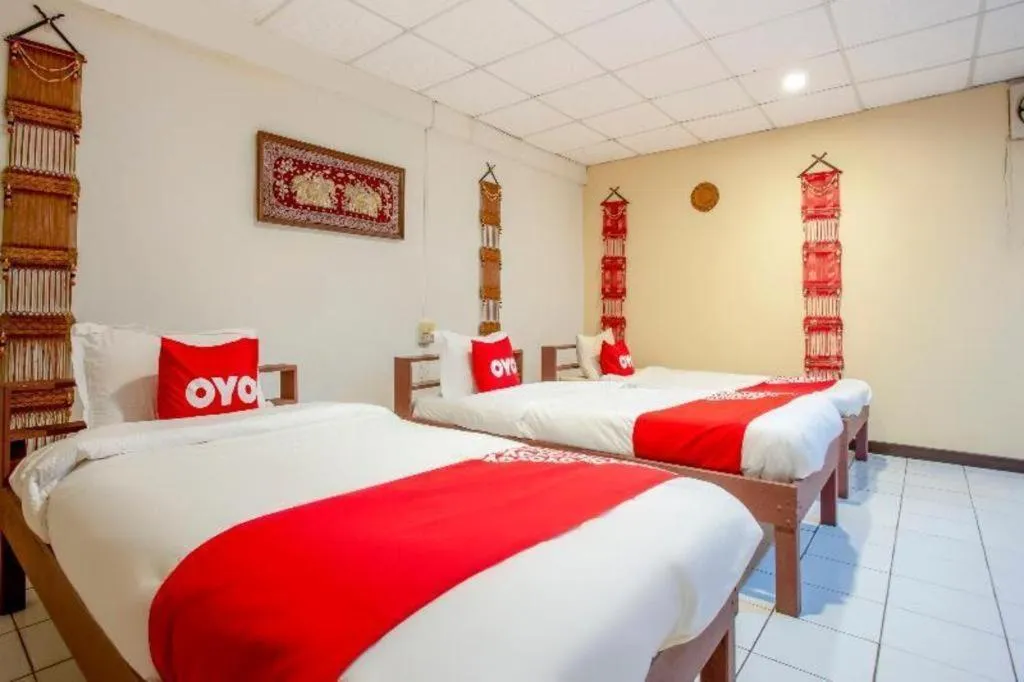 Bed in OYO 1000 Maetang Hotel